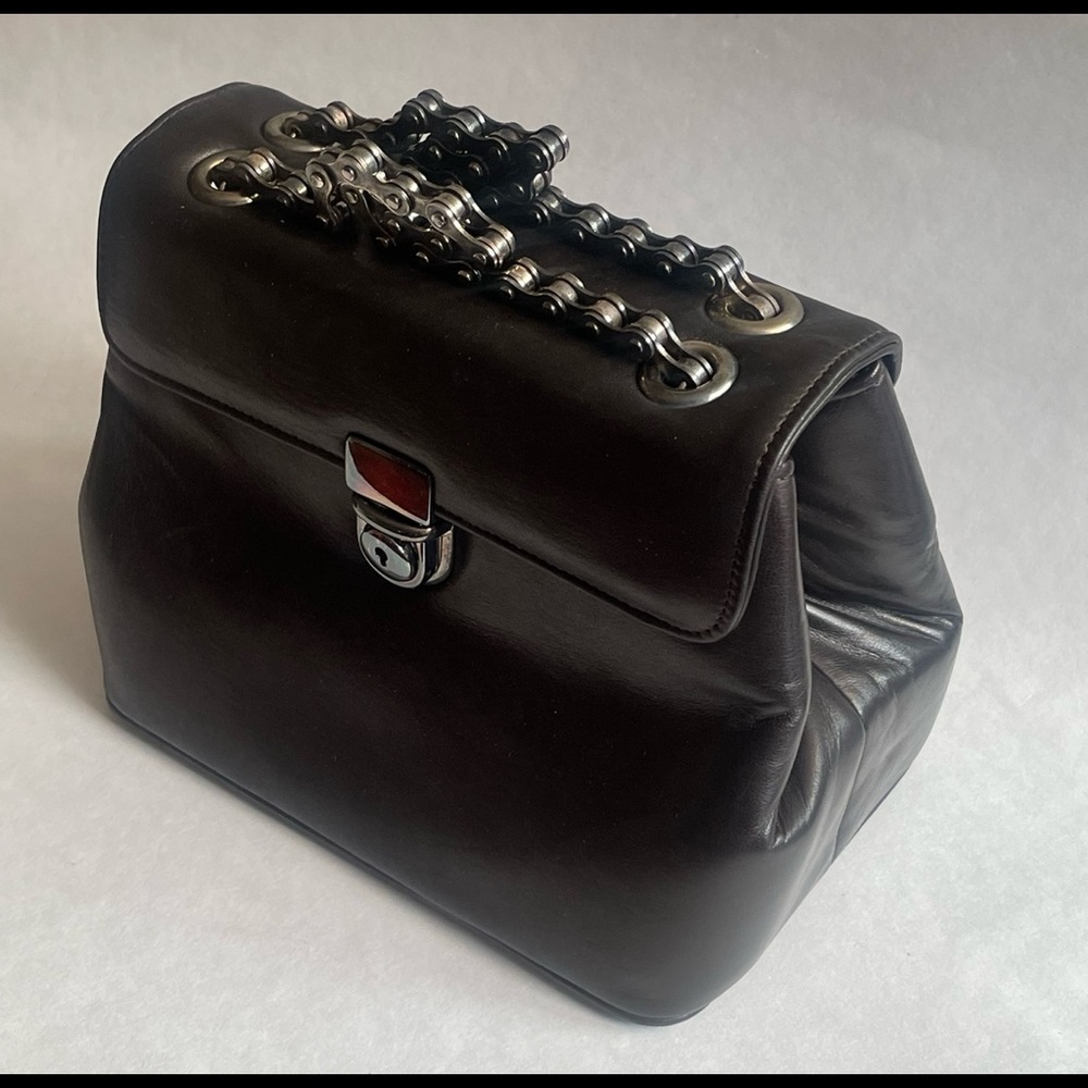 Fevrier leather ladies handbag, with bicycle chain handles.